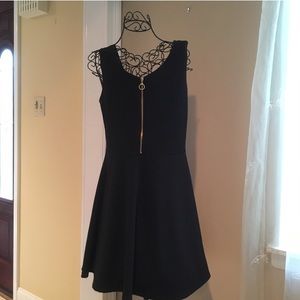 Black dress with zipper detail on front